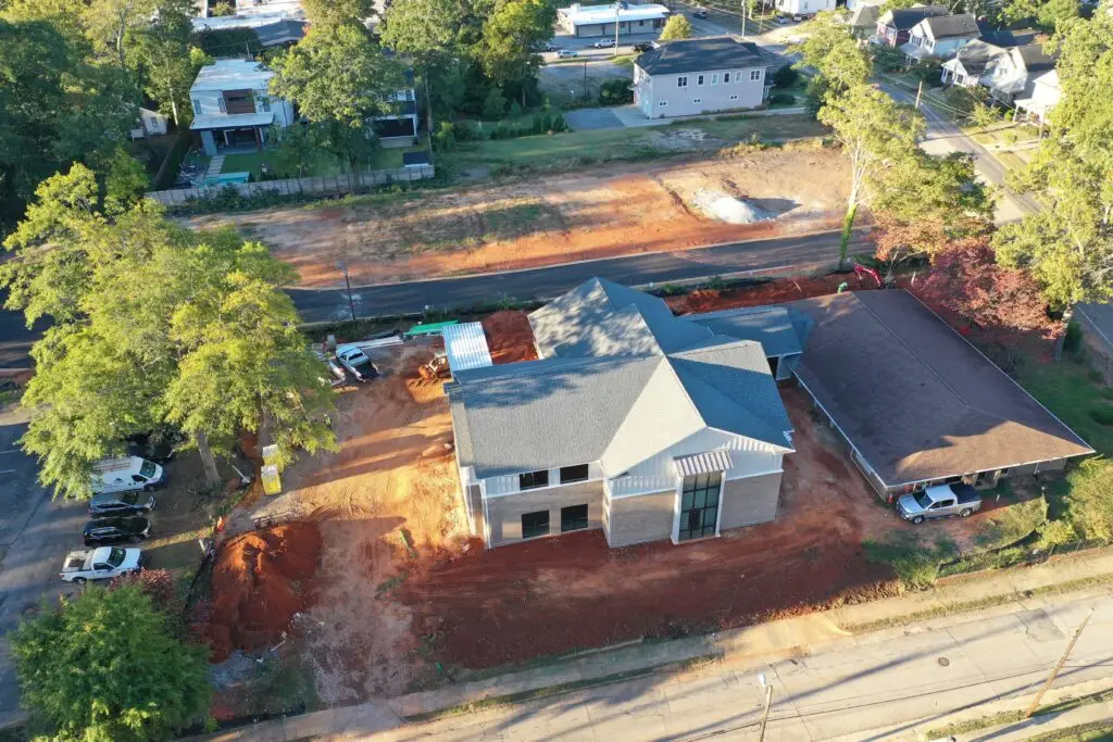 West End Baptist Church, new building, light colored brick with large pane glass window on front