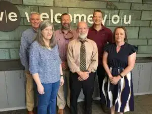 Staff, past & present - Back row: Stephen Miller, Jason Reid, Ted Richard; Front Row: Kendra Irish, Pastor Marty Price, Alyssa Herbert